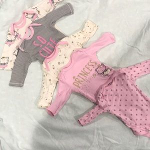 Five baby girl onesies